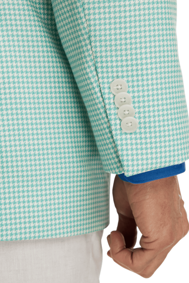 Chaqueta de lana con solapa de pico y botonadura sencilla en pata de gallo verde y blanca