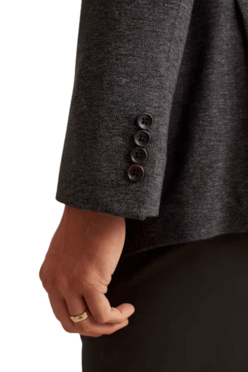 Chaqueta de botonadura sencilla con solapas anchas y dos botones de color negro