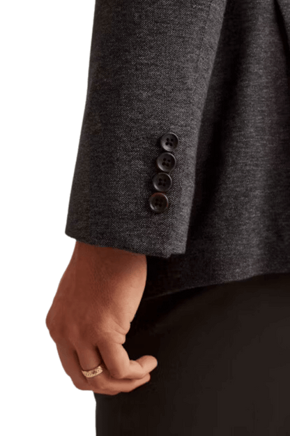 Chaqueta de botonadura sencilla con solapas anchas y dos botones de color negro