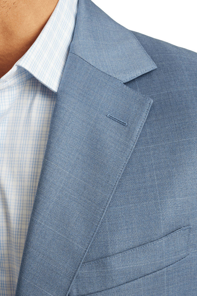 Veste à simple boutonnage en laine bleue à revers crantés et coupe moderne