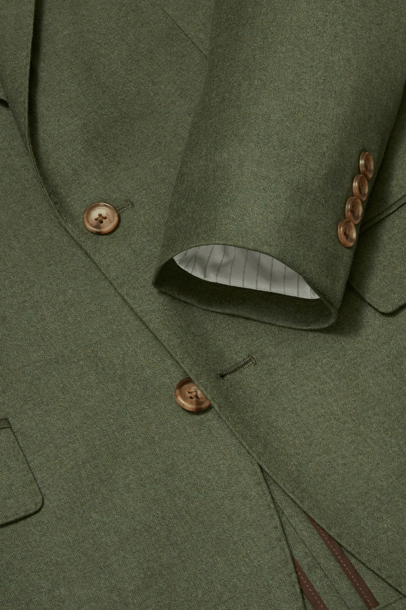 Traje de solapa con muesca de dos botones de lana elástica verde