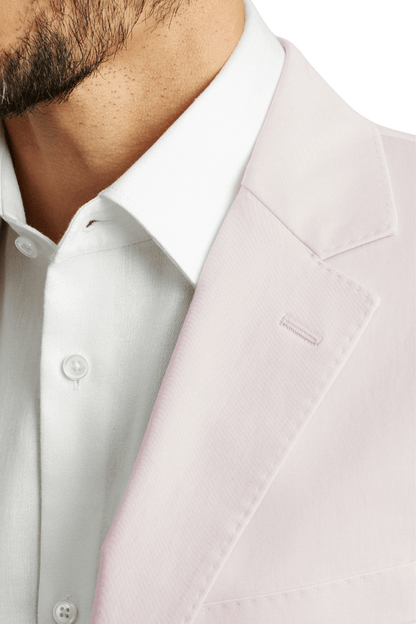 Traje italiano rosa de corte moderno con botonadura sencilla y dos botones