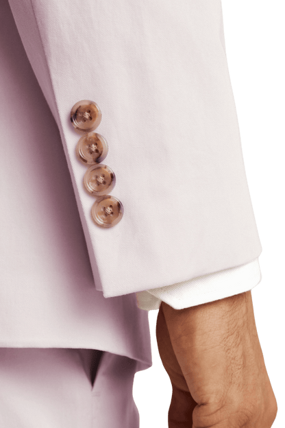 Traje italiano rosa de corte moderno con botonadura sencilla y dos botones